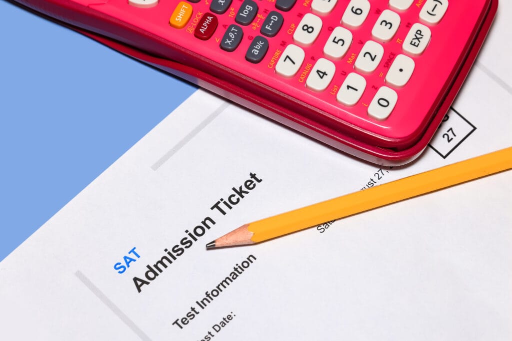 SAT admission test ticket with pencil and Calculator